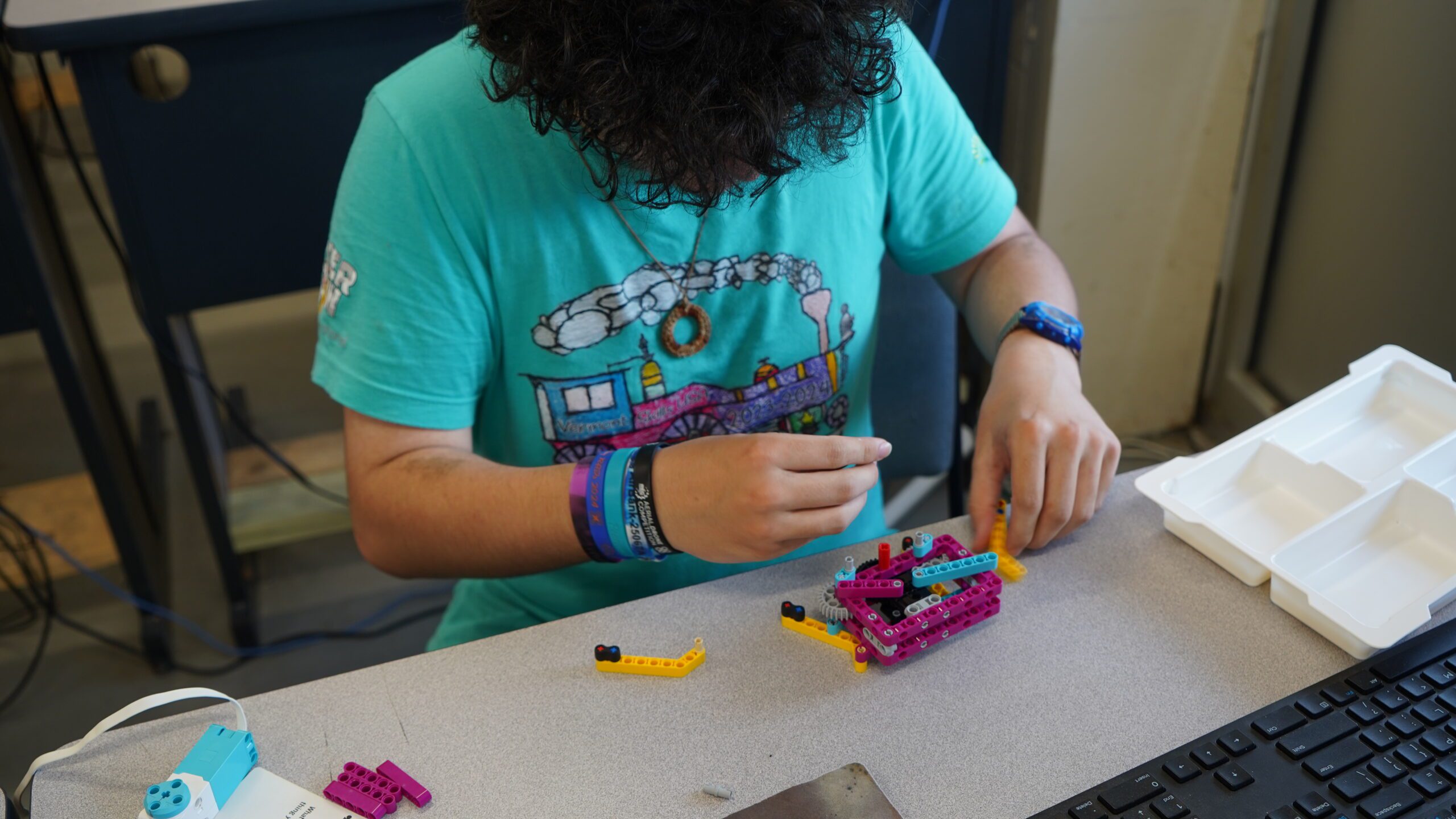 STEAM camper Sam working on their walker