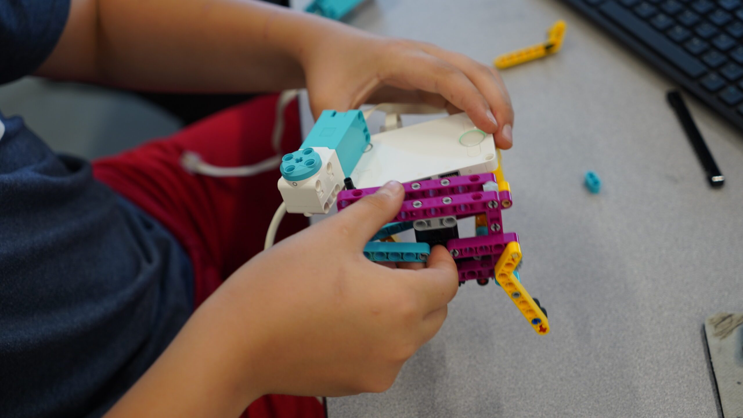 STEAM campers Sam and Max's walker project