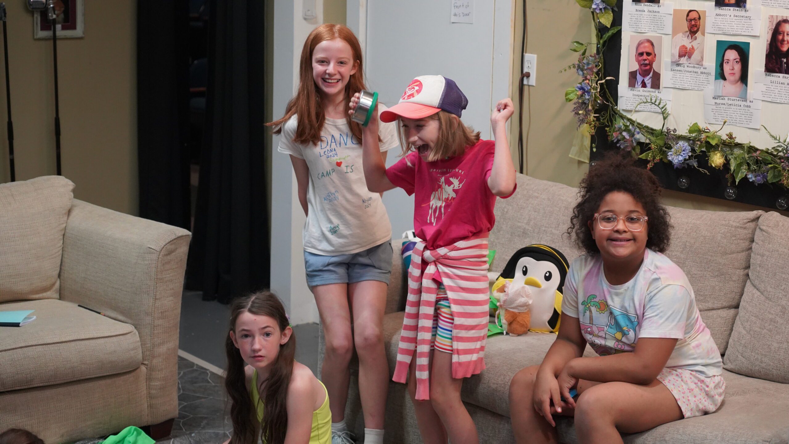 Young Theater campers smiling and laughing